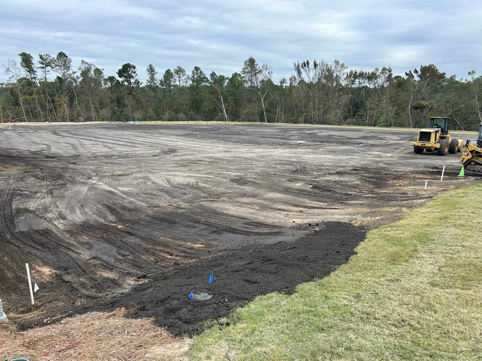 You Grow Girl engineered topsoil spread across the project area